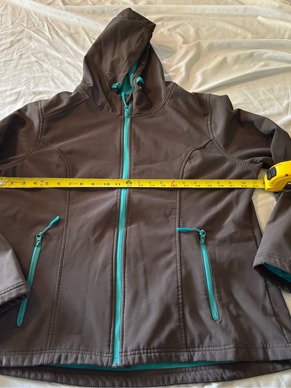 Woman’s Hooded Softshell Jacket in Dark Gray with Teal Accents